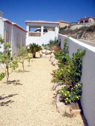 Side view showing car port, villa, denia, spain